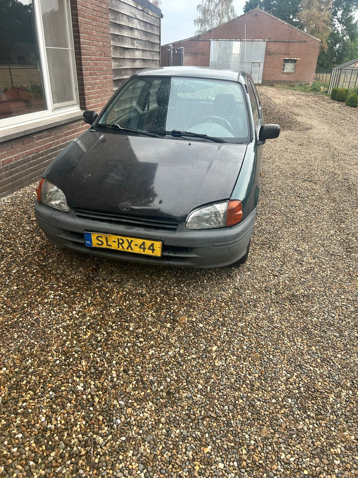 Toyota Starlet 1.3 16V 1997 Groen, Auto's, 4 cilinders, Starlet, 400 kg, Origineel Nederlands