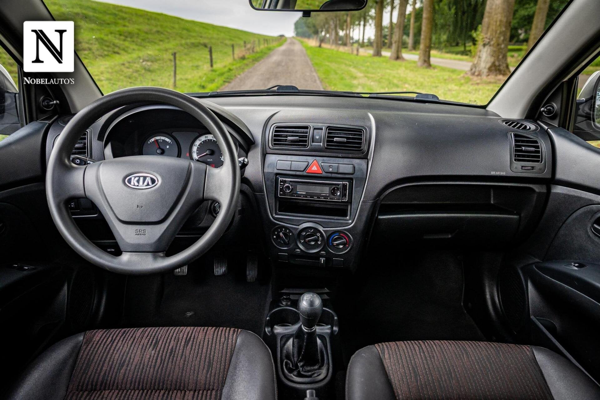 Kia Picanto 1.0 Fifteen |Zuinig|Elektrische ramen|Apk 9-2027, Auto's, Voorwielaandrijving, 4 cilinders, Met garantie (alle), 400 kg