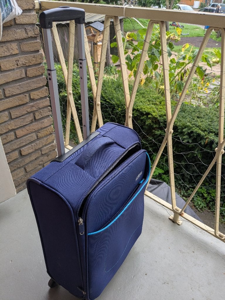 Ongebruikte American tourister rolkoffer, Uitschuifbare handgreep, 50 tot 60 cm, Nieuw, Ophalen of Verzenden