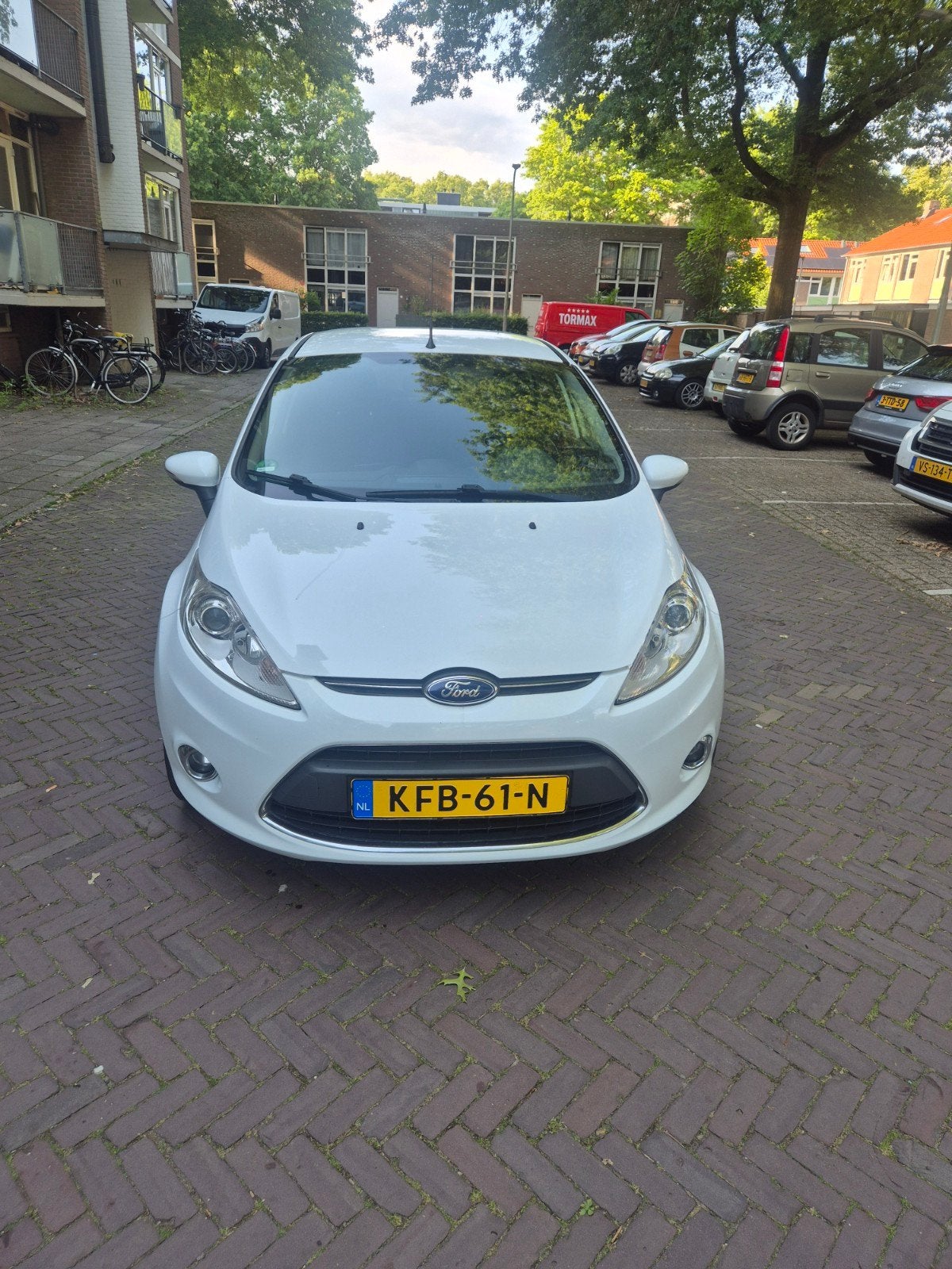 Ford Fiesta 1.4 LPG 2011Titanium uitvoering Navi + Bluetooth, Auto's, Ford, Voorwielaandrijving, Euro 5, Wit, 14 km/l