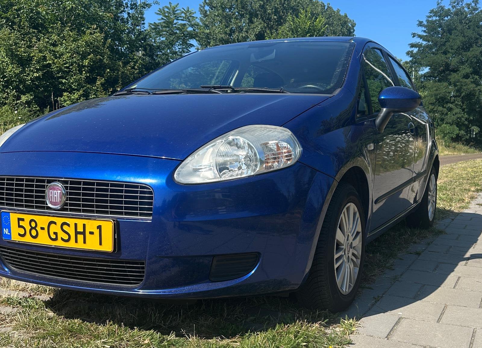 Fiat Grand Punto 2008 airco en nieuwe apk, Auto's, Stof, 1242 cc, 4 cilinders, Blauw