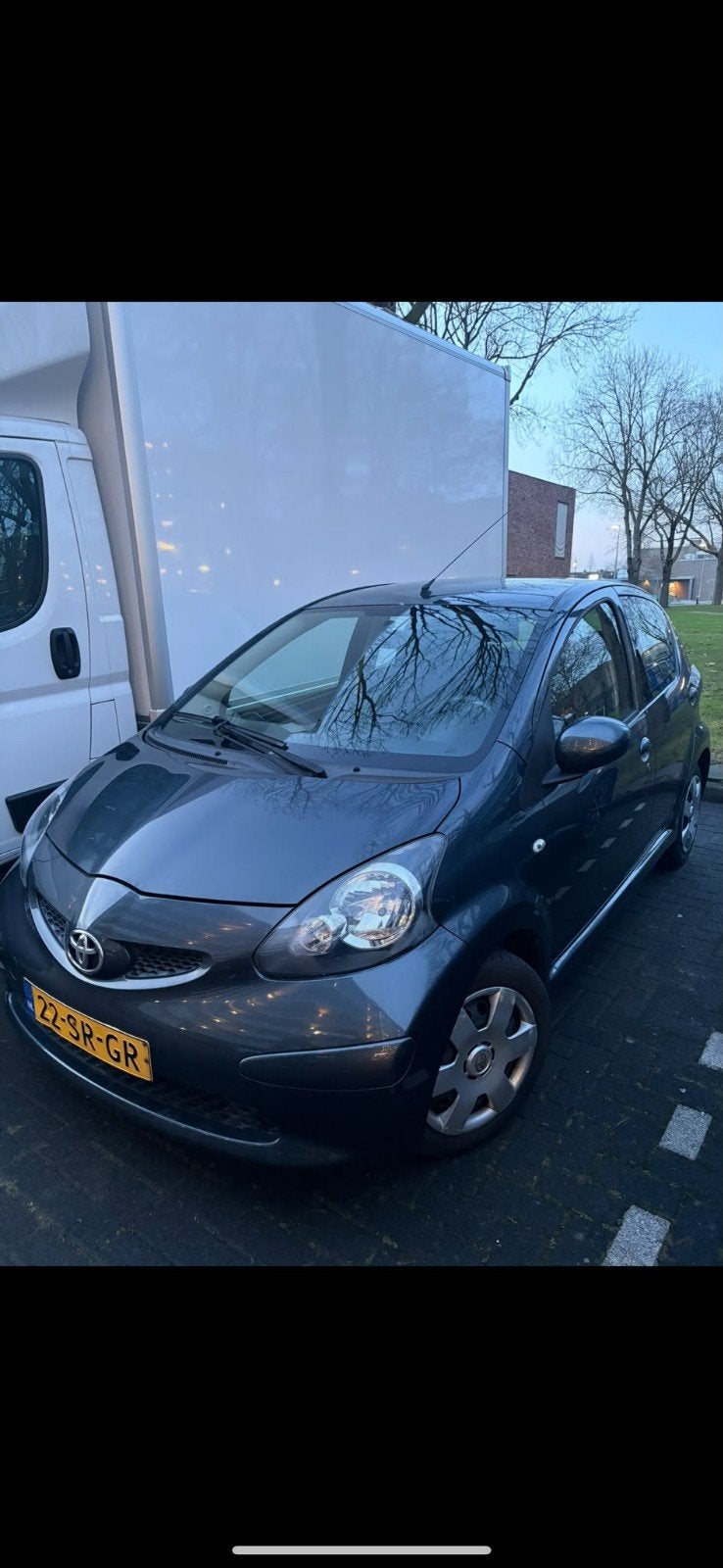 Toyota Aygo 1.0 12V Vvt-i 5DRS 2006 Grijs, Auto's, Toyota, Voorwielaandrijving, 4 stoelen, 68 pk, Origineel Nederlands