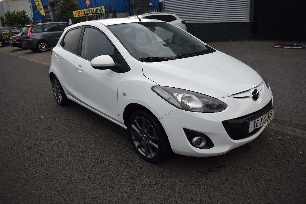 Mazda 2 1.3 Bifuel 62KW 5DRS 2012 Wit NIEUWE APK, Auto's, Mazda, Voorwielaandrijving, 15 km/l, 37 €/maand, Bluetooth