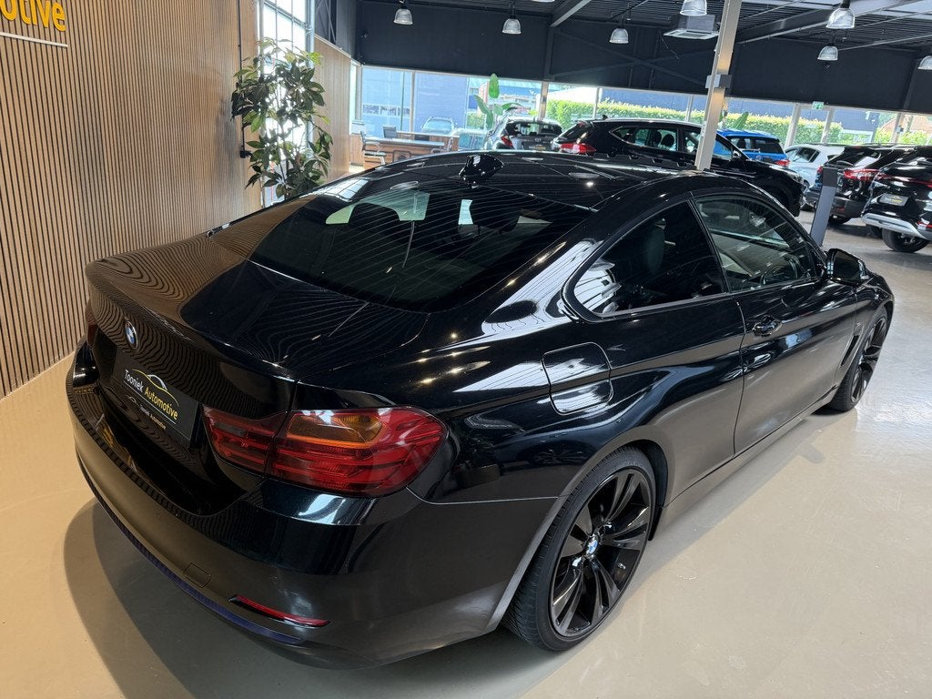 BMW 4 Serie Coupé 420i High Executive Let Op ! Tuning 250pk, Auto's, BMW, Automaat, Achterwielaandrijving, Gebruikt, Met garantie (alle)
