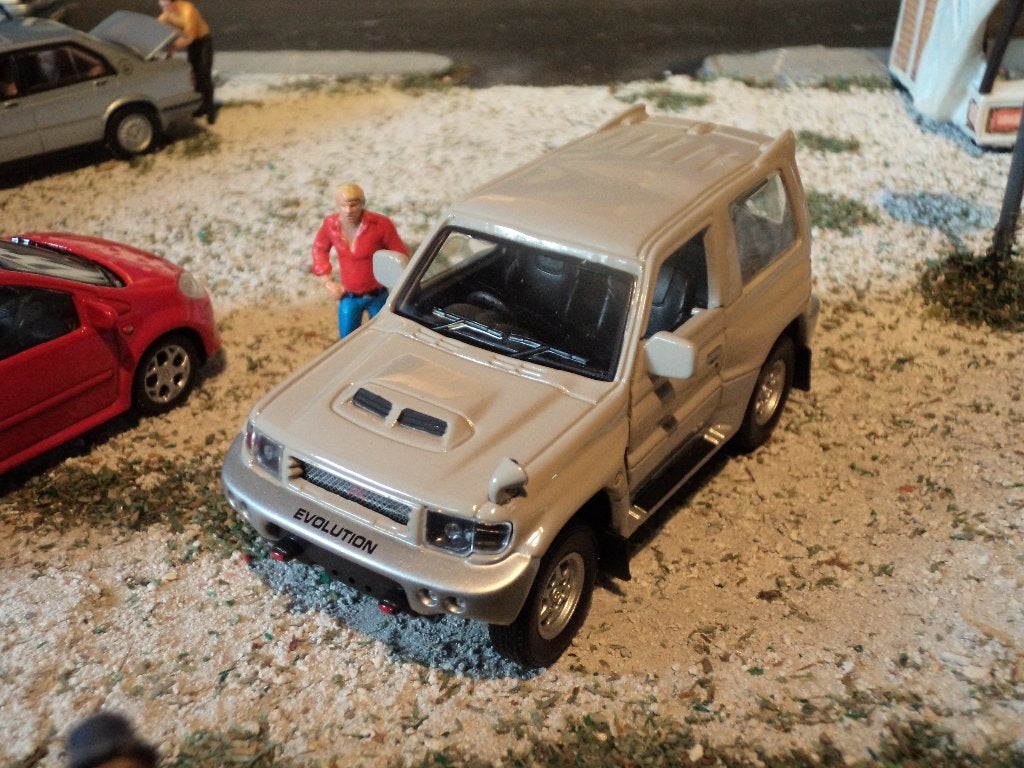 1/43 Mitsubishi Pajero Evolution - Cararama grijs, Ophalen of Verzenden, Zo goed als nieuw, Auto, Overige merken