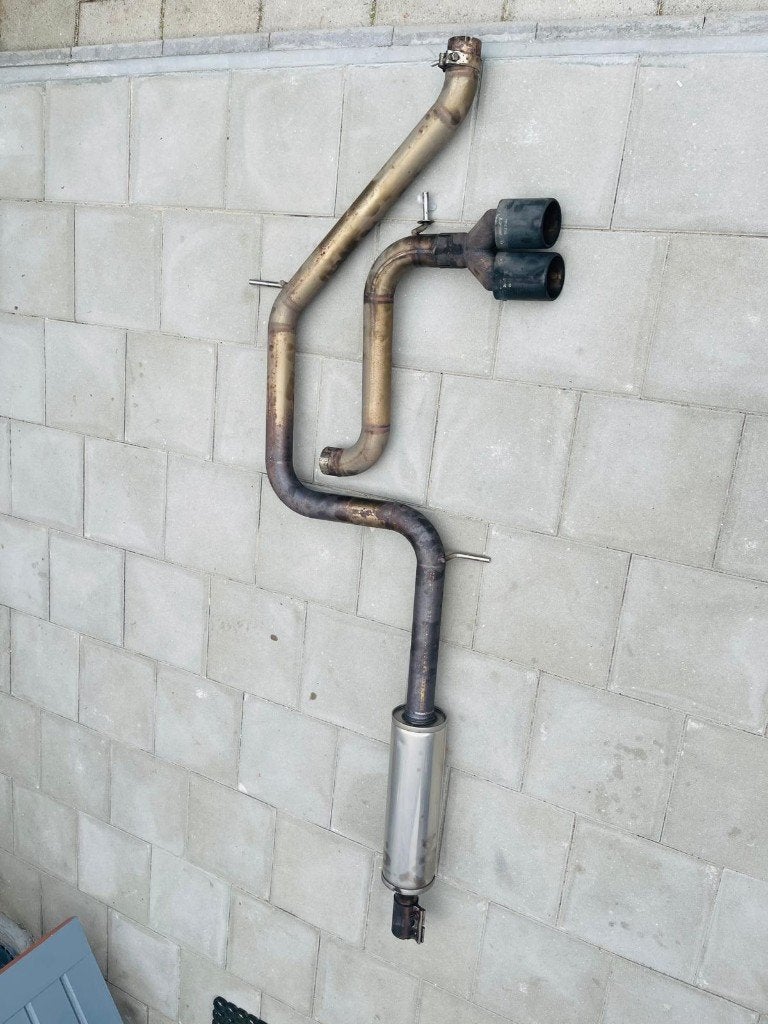 Originele Akrapovic TP-CT/10 uitlaat Golf 7 1.4 TSI Carbon, Ophalen, Gebruikt, Audi