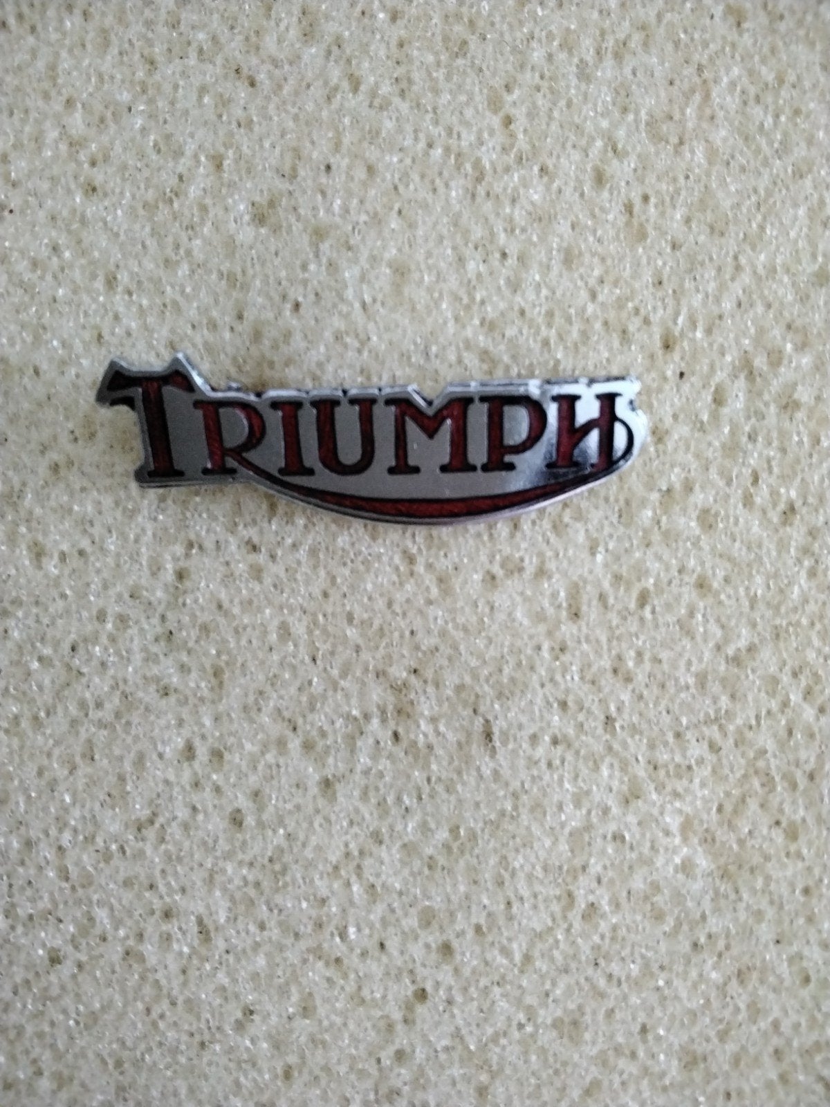 Emaille Triumph broche, Ophalen of Verzenden, Transport
