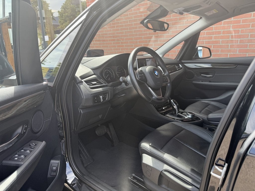 BMW 2 Serie Active Tourer 218i Executive Edition Automaat Le, Auto's, 12 maanden, Gebruikt, Euro 6, Zwart