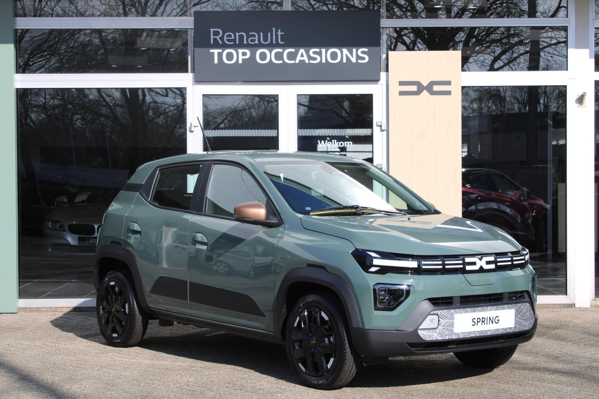 Dacia Spring Extreme 65 26.8 kWh Lichen Kaki, Auto's, Huisgarantie, Met garantie (alle), 4 stoelen, Leder en Stof