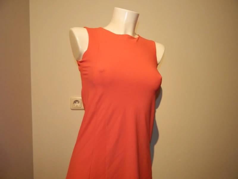 Ladress koraal kleurige stretch top iets langer model XS, Overige kleuren, Verzenden, Zo goed als nieuw, Zonder mouw