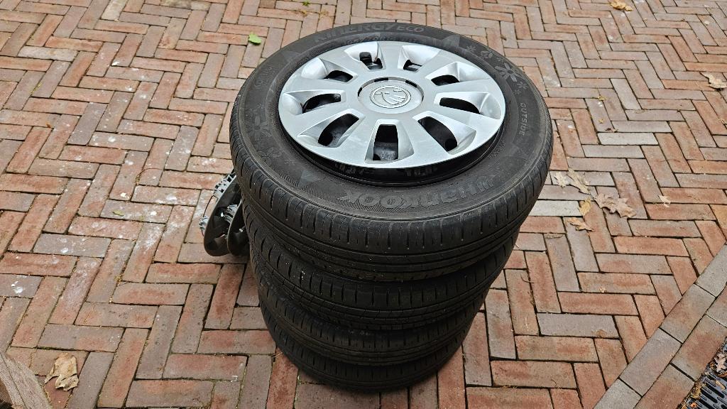 Set originele Skoda Citigo e velgen met banden + wielkappen, Auto-onderdelen, Banden en Velgen, Ophalen, 14 inch, Gebruikt, Band(en)