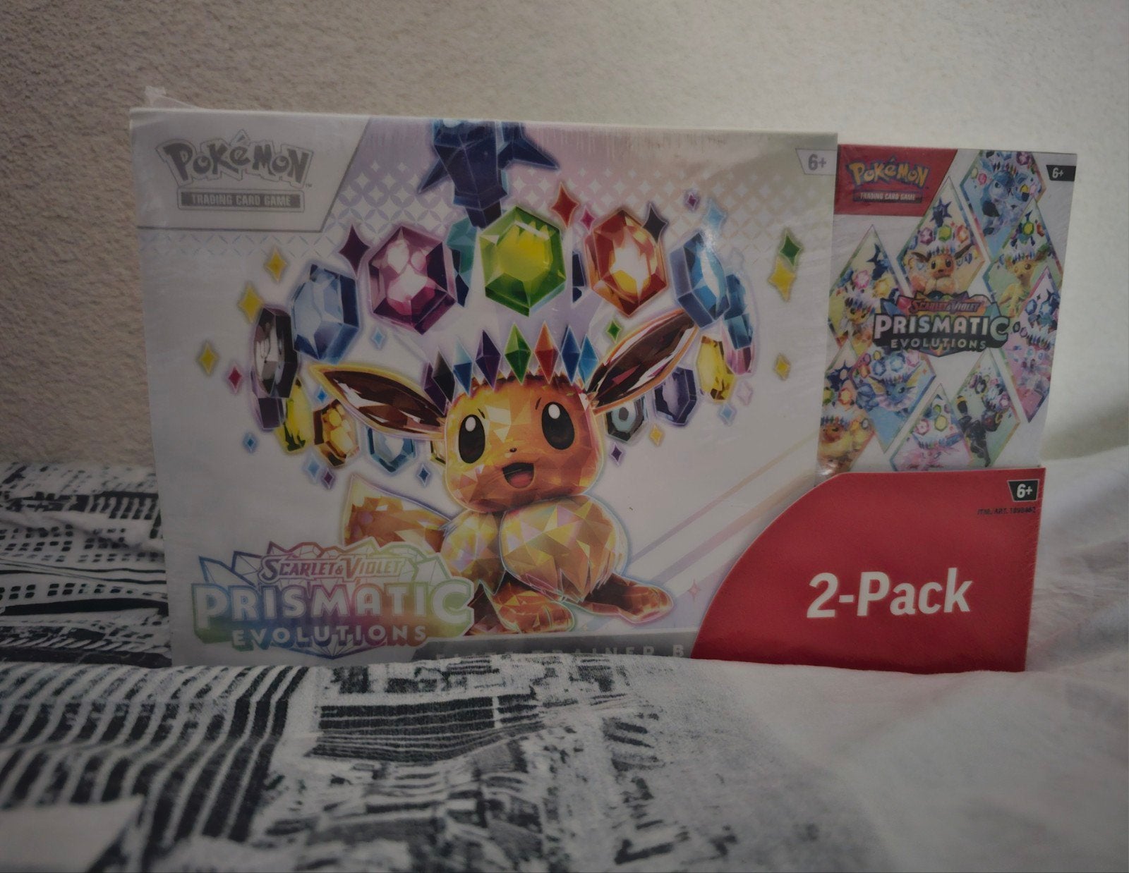 Pokémon Prismatic Evolutions 2-pack, ETB & Booster Bundle, Ophalen of Verzenden, Nieuw, Overige typen