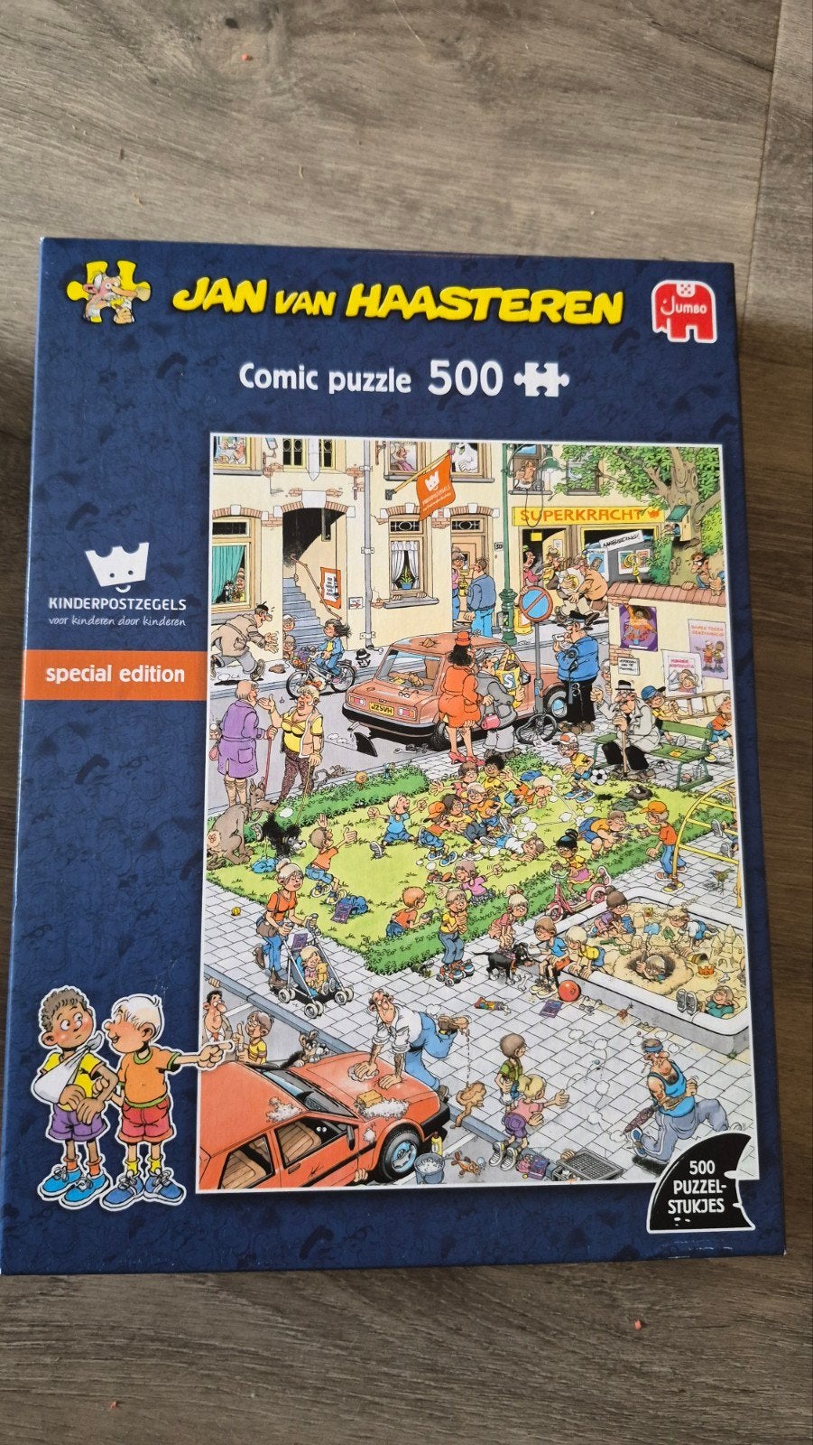 2 Jan van Haasteren puzzels bijna klaar en kinderpostzegels, Ophalen of Verzenden, 500 t/m 1500 stukjes, Zo goed als nieuw, Legpuzzel