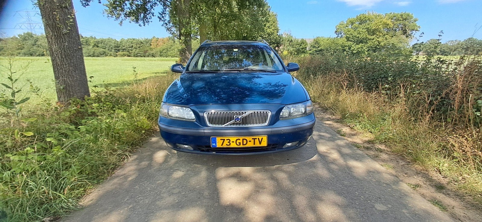 Te koop volvo v70, Auto's, Voorwielaandrijving, Stof, Beige, Blauw