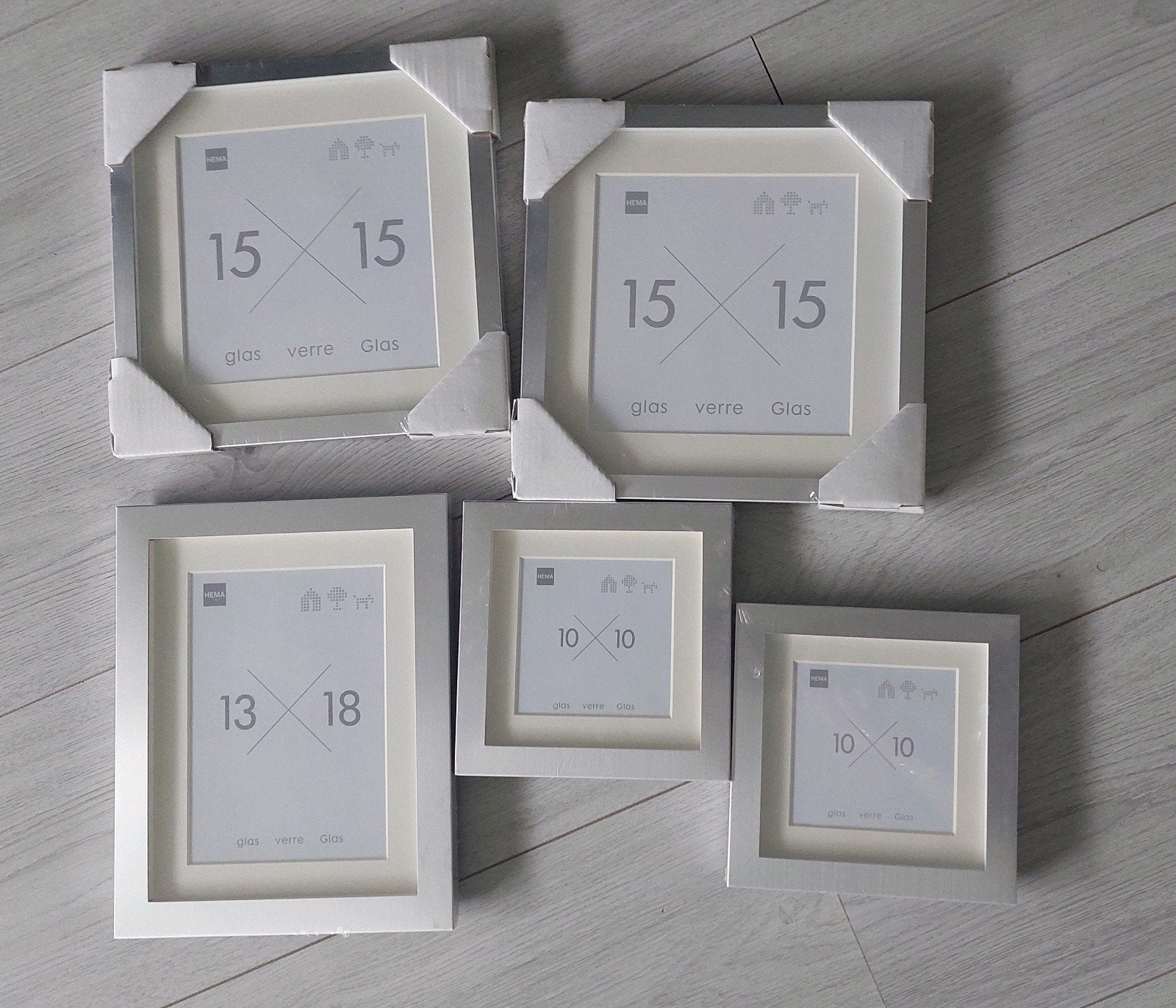 Nieuw! HEMA fotolijsten, mat zilver + passe-partout, Hangend, Nieuw, Ophalen of Verzenden, Fotolijst
