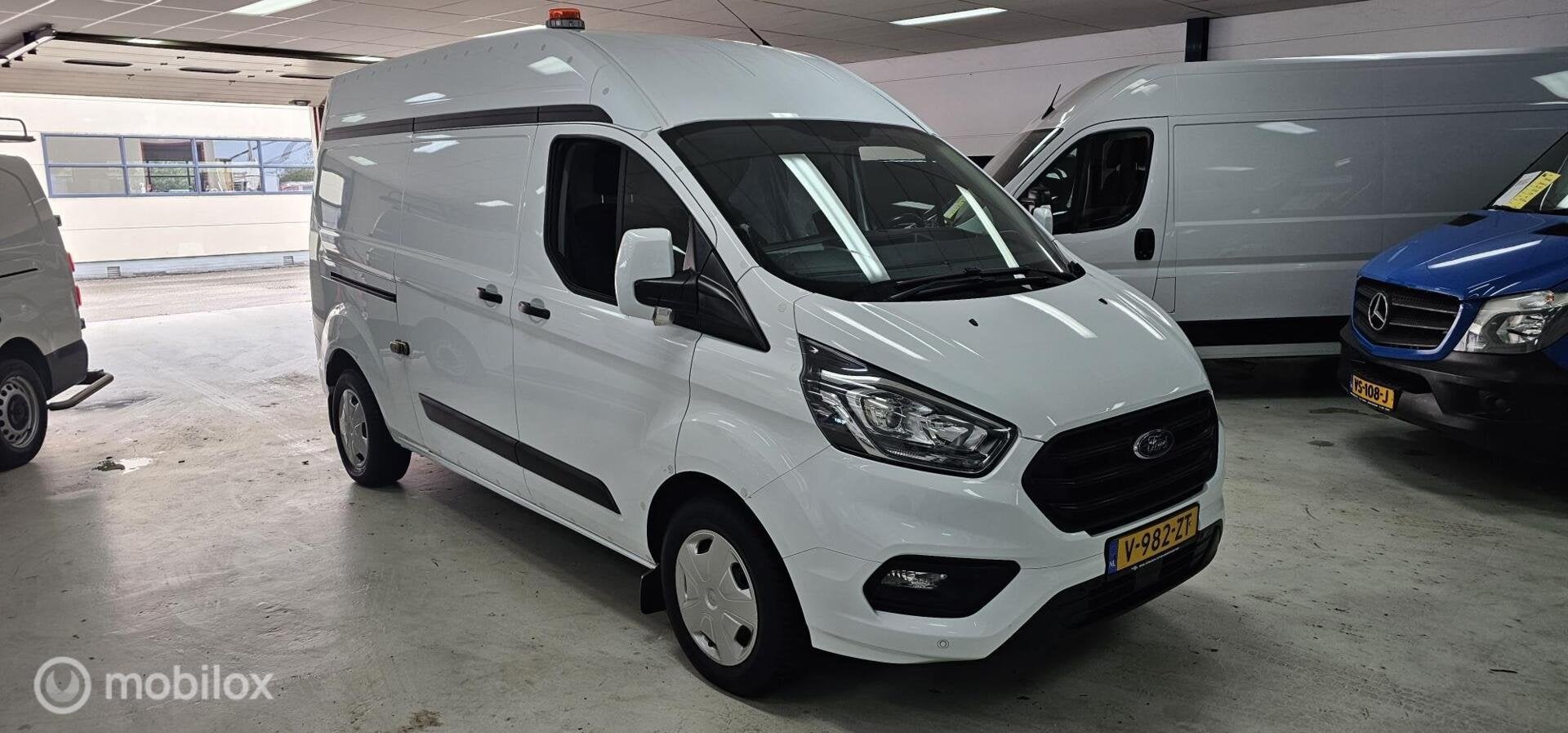 Ford Transit Custom 320 2.0 TDCI L2H2 Trend, Gebruikt, 4 cilinders, Wit, Origineel Nederlands