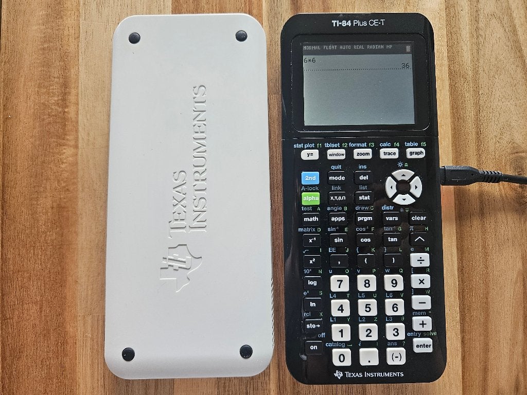 TI 84 Plus CE T Grafische Rekenmachine, Ophalen of Verzenden, Grafische rekenmachine, Zo goed als nieuw