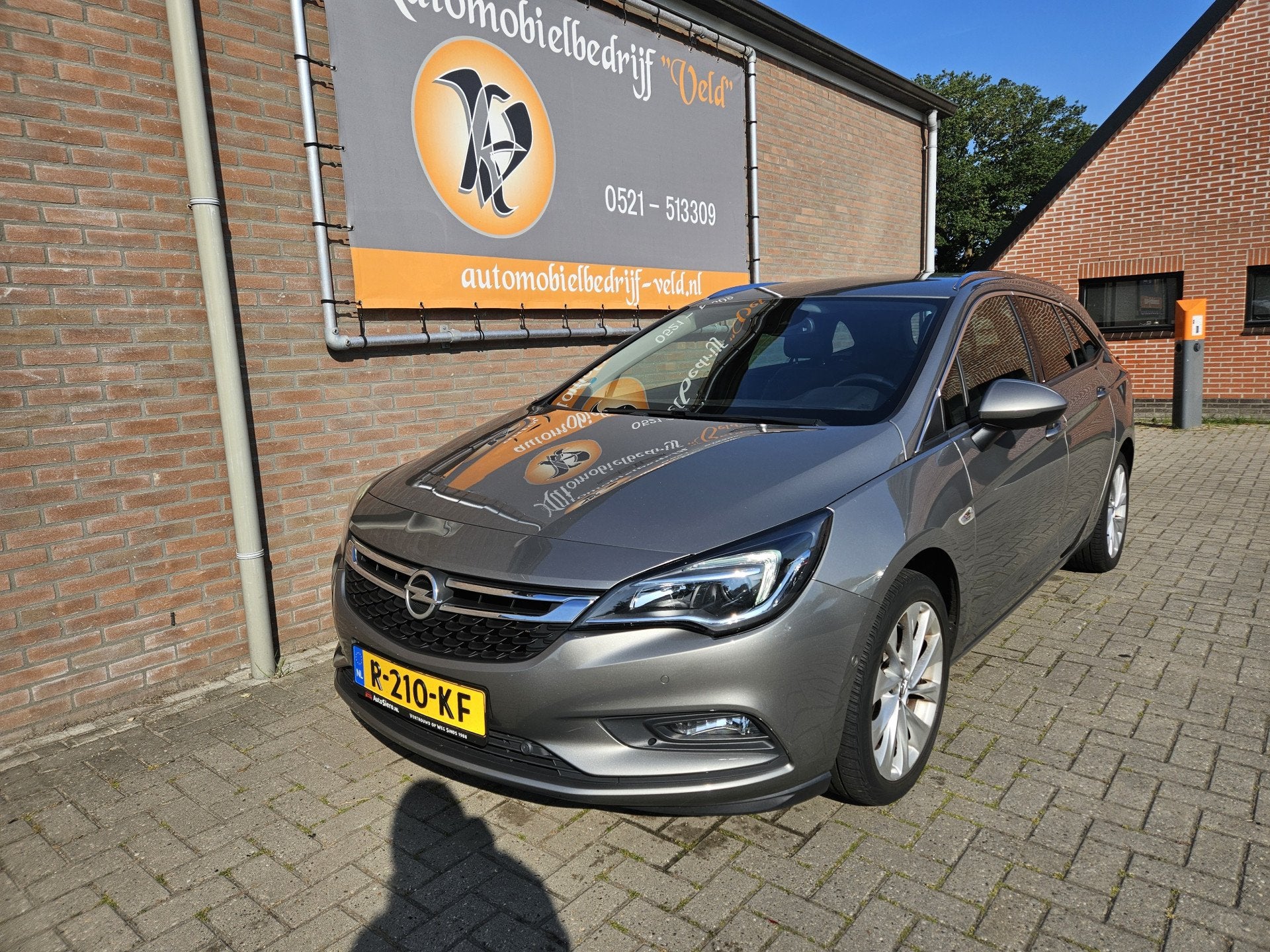 Opel Astra Sports Tourer 1.4 Turbo S/S (bj 2016), Auto's, Voorwielaandrijving, Gebruikt, 4 cilinders, Leder en Stof