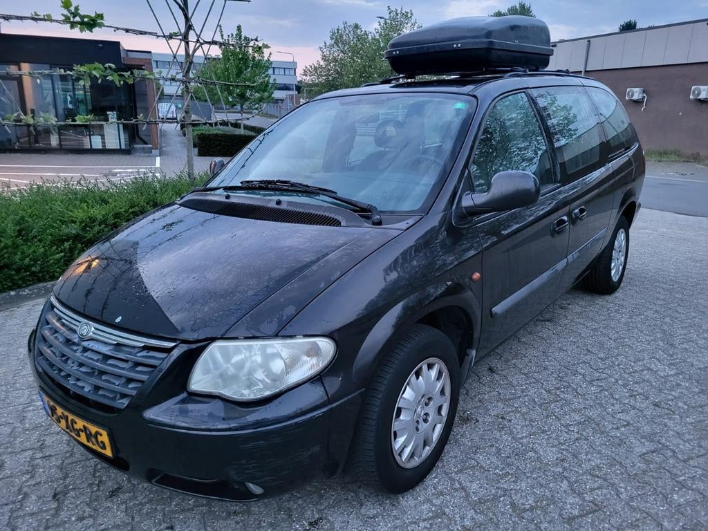 Chrysler Grand Voyager 3.3 I 128KW 2007 Zwart, Auto's, 3301 cc, Grand Voyager, 7 stoelen, Zwart
