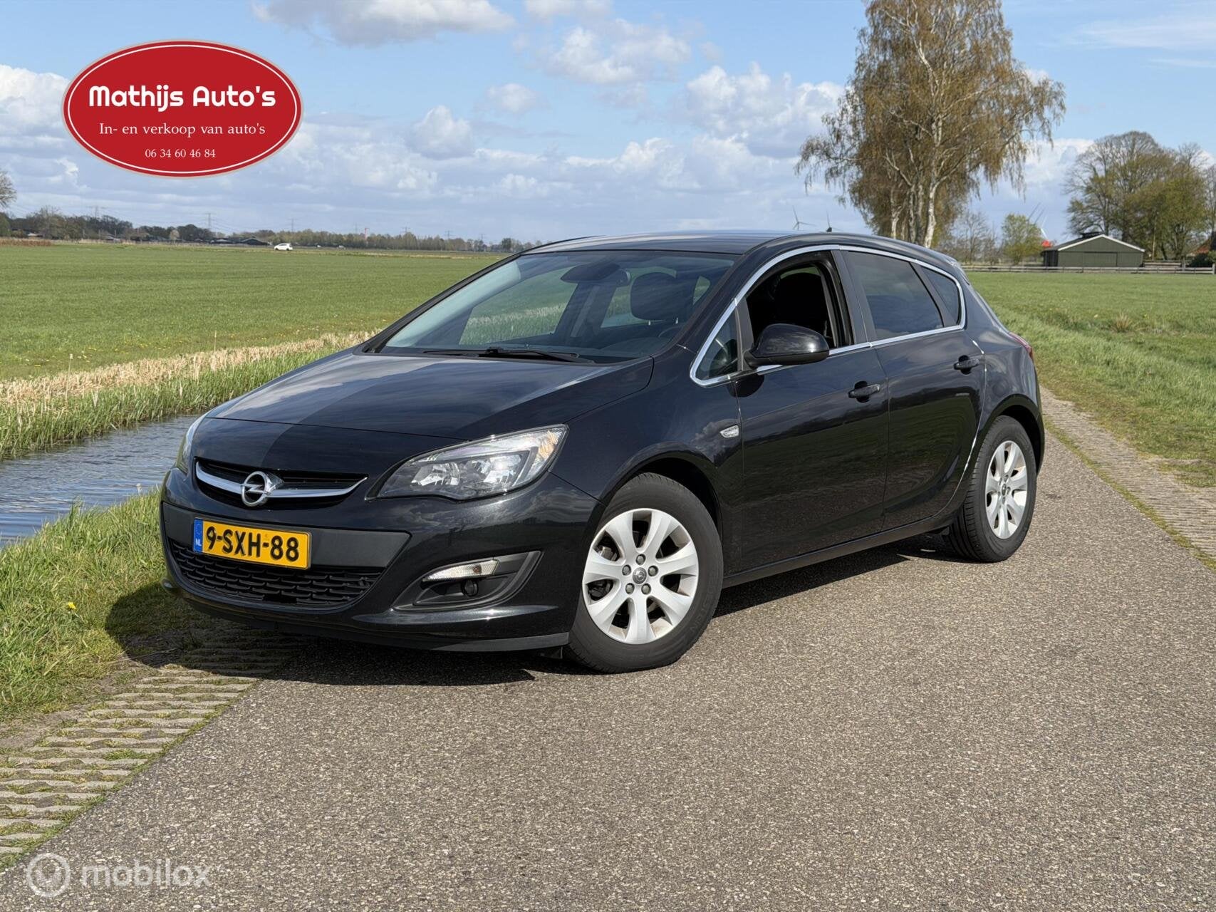 Opel Astra 1.4 Turbo Cosmo Navi Hatchback nette staat!, Auto's, Voorwielaandrijving, 680 kg, 4 cilinders, Zwart