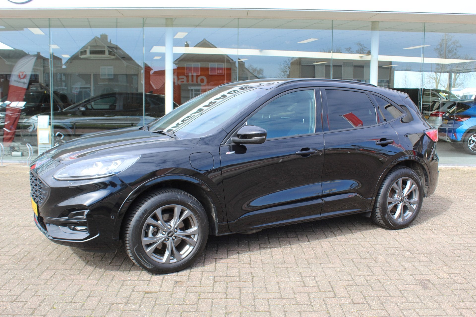 Ford Kuga 2.5-225pk Plug-in Hybrid ST-Line X. Hybride rijden, Auto's, Ford, 12 maanden, Gebruikt, Zwart, 4 cilinders