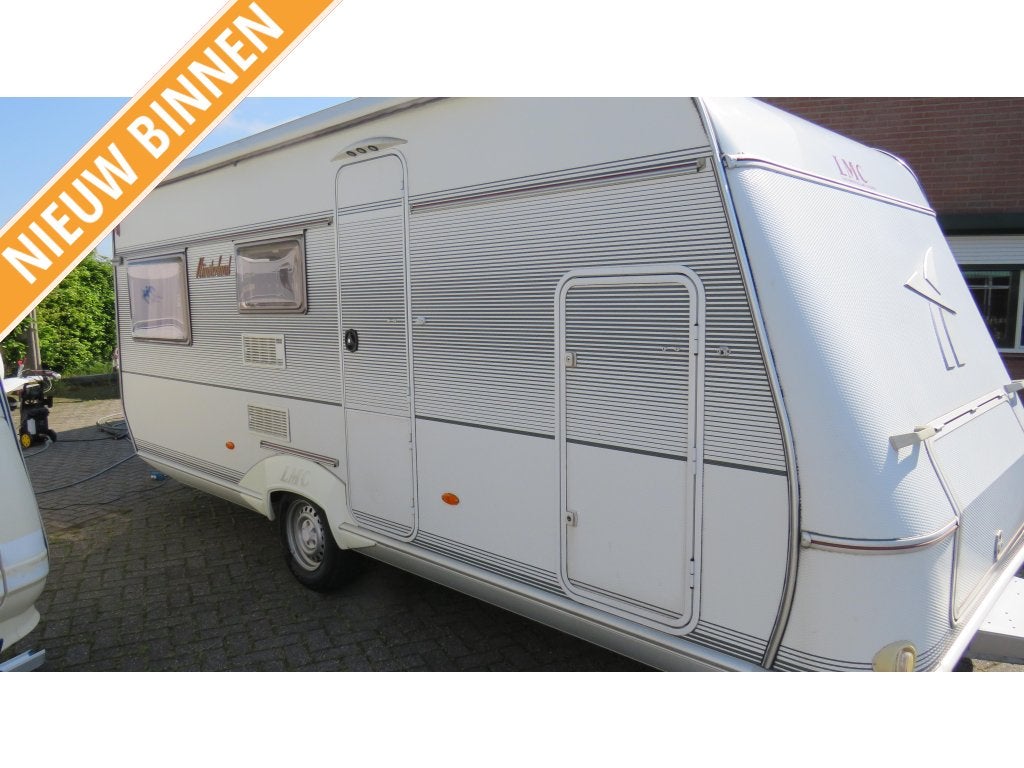 LMC MUNSTERLAND 530TK BJ 2003 STAPELBEDDEN €6999, Caravans en Kamperen, Caravans, Niet ingevuld, Dwarsbed, Rondzit, Bedrijf
