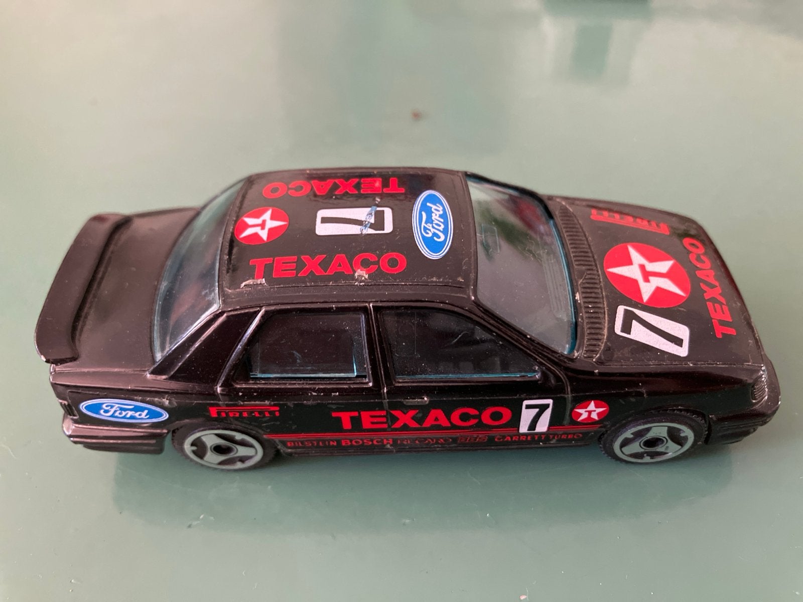 Burago Ford Sierra Texaco 1:43 modelauto, Ophalen of Verzenden, Gebruikt