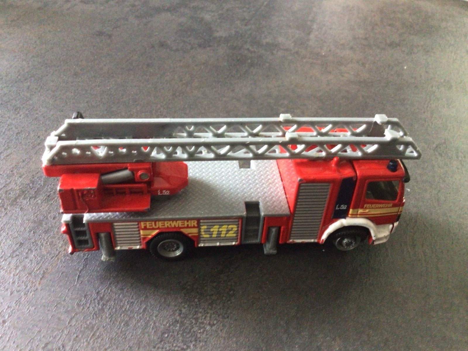 Metalen brandweerwagen met uitschuifbare ladder, Ophalen of Verzenden, Gebruikt