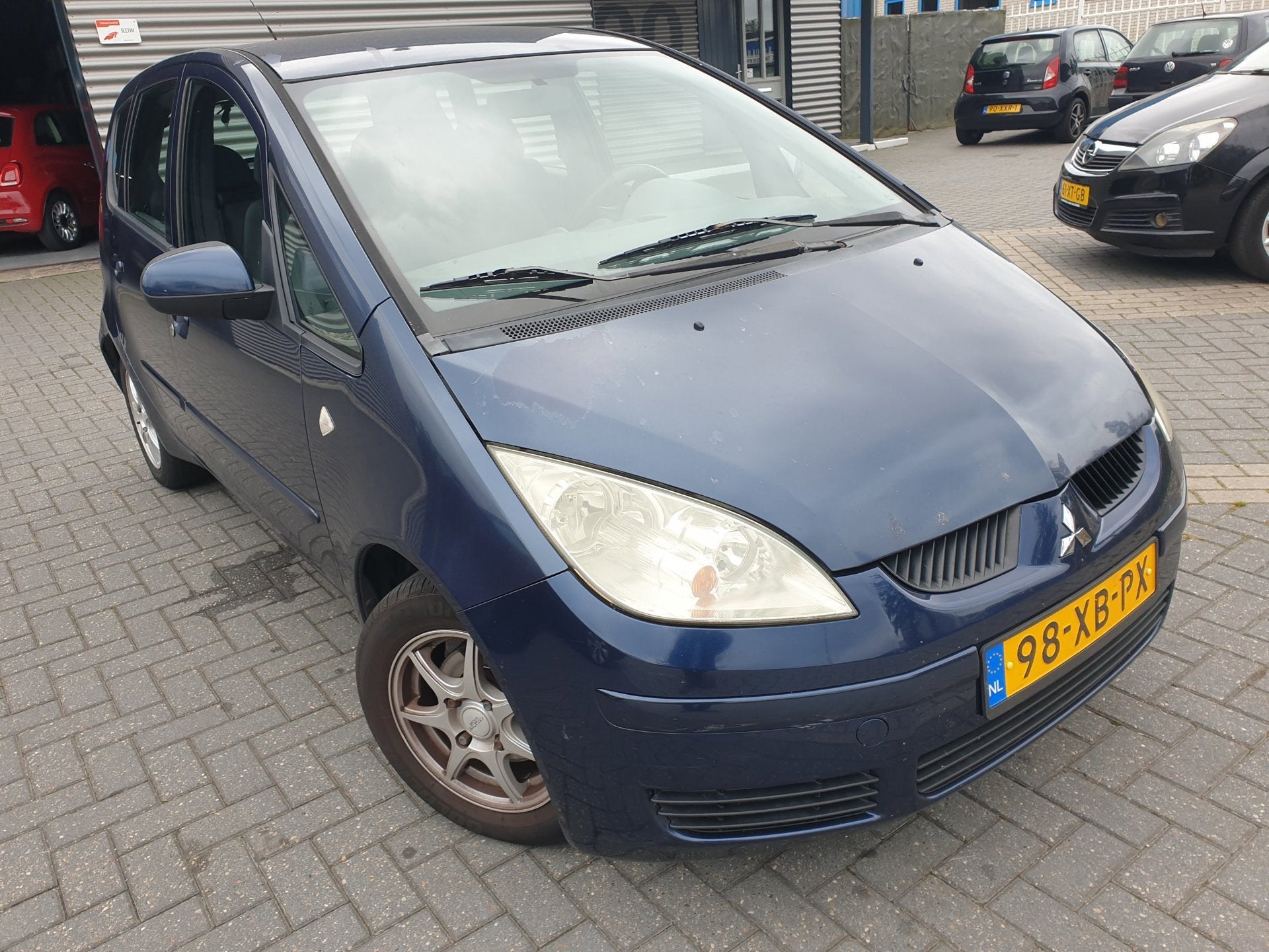 Mitsubishi Colt 1.3 Invite Airco-El-ramen, Auto's, Stof, Gebruikt, 31 €/maand, Blauw