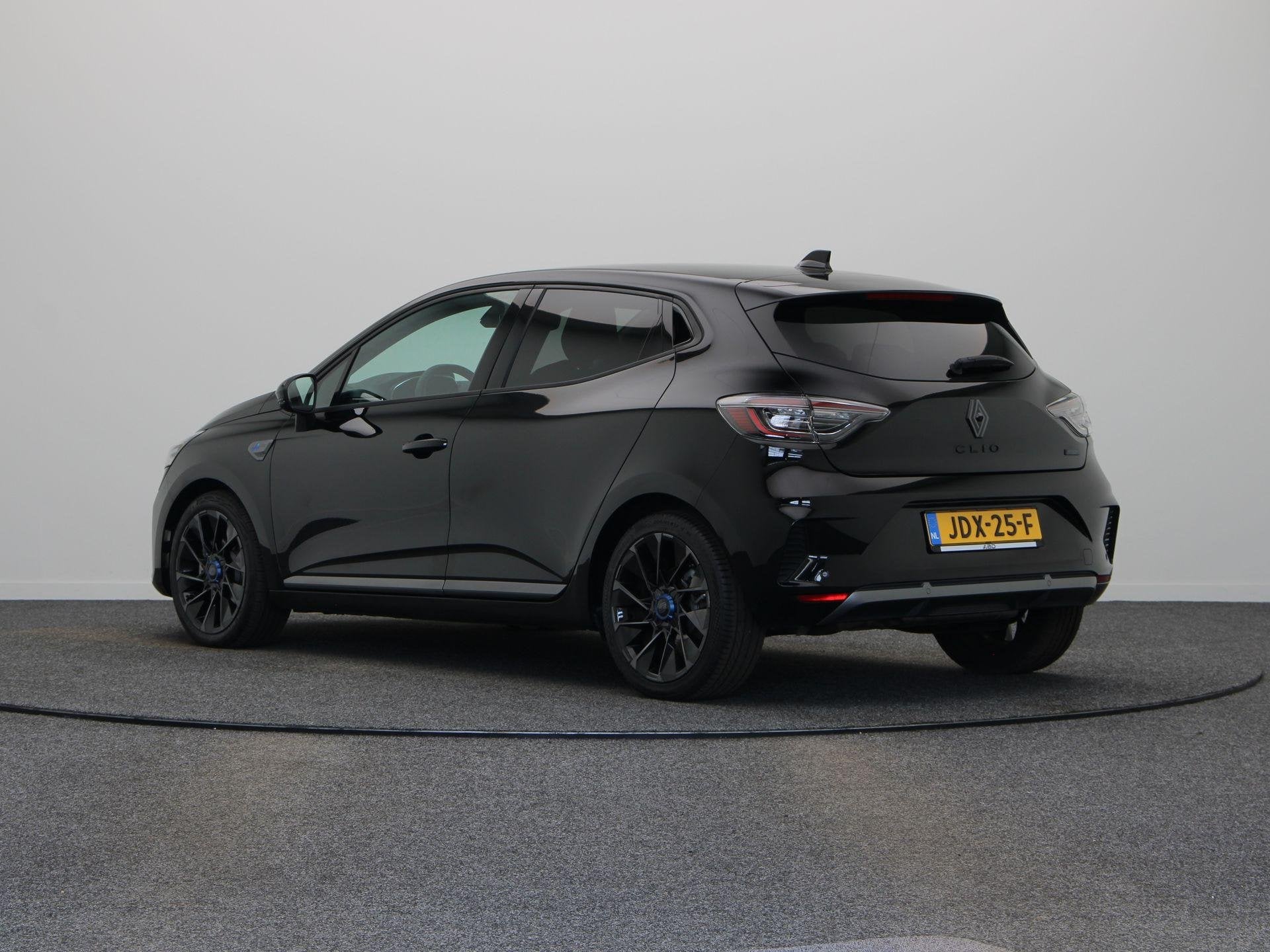 Renault Clio E-Tech Full Hybrid 145pk esprit Alpine | Achter, Gebruikt, Euro 6, Leder en Stof, Zwart
