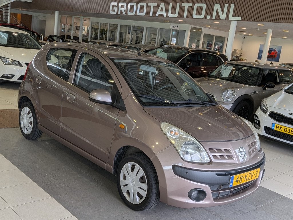 Nissan Pixo 1.0 Acenta Airco, Stuurbekrachtiging (bj 2010), Auto's, Nissan, Voorwielaandrijving, Euro 5, Stof, Gebruikt