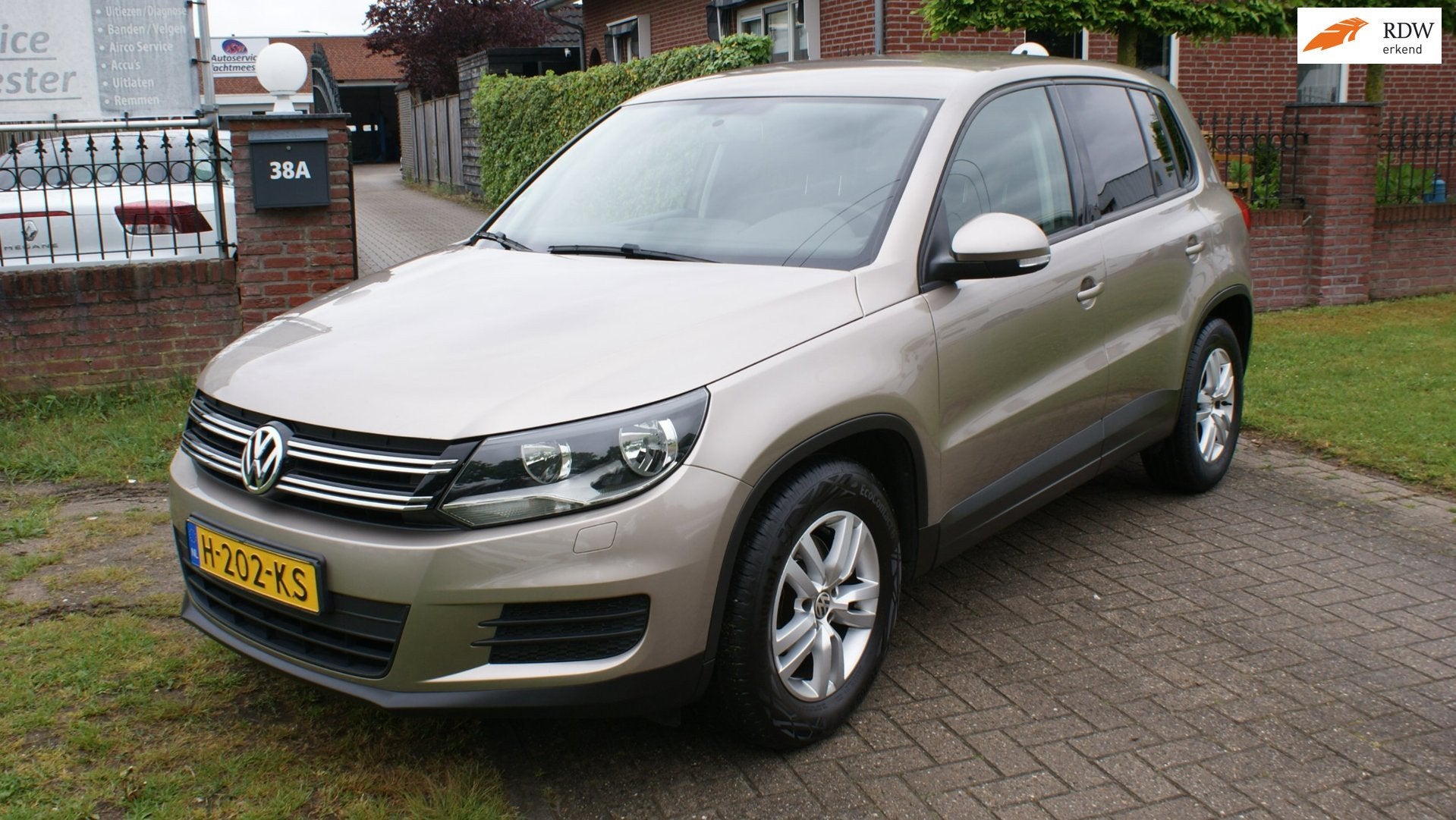 Volkswagen Tiguan 1.4 TSI Sport&Style, Auto's, Voorwielaandrijving, Euro 5, Gebruikt, Zwart