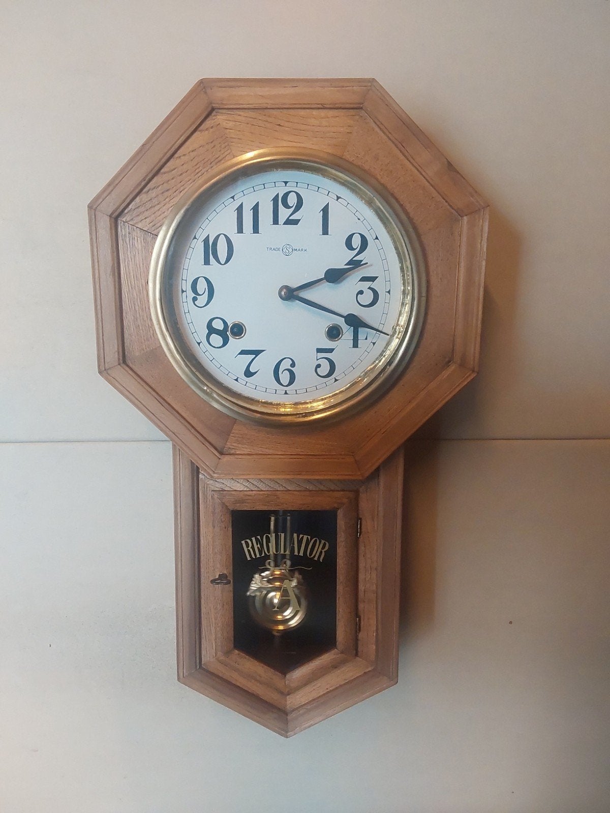 wandklok Regulator A, Ophalen