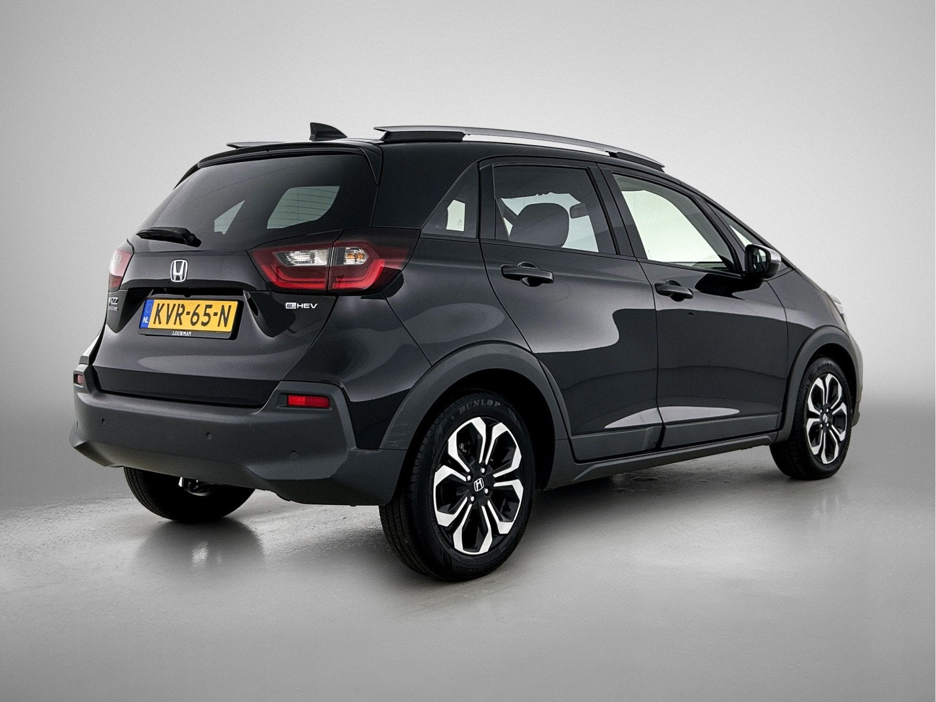 Honda Jazz 1.5 e:HEV Crosstar | Navigatie | Stoelverwarming, Auto's, Euro 6, 4 cilinders, Leder en Stof, Zwart