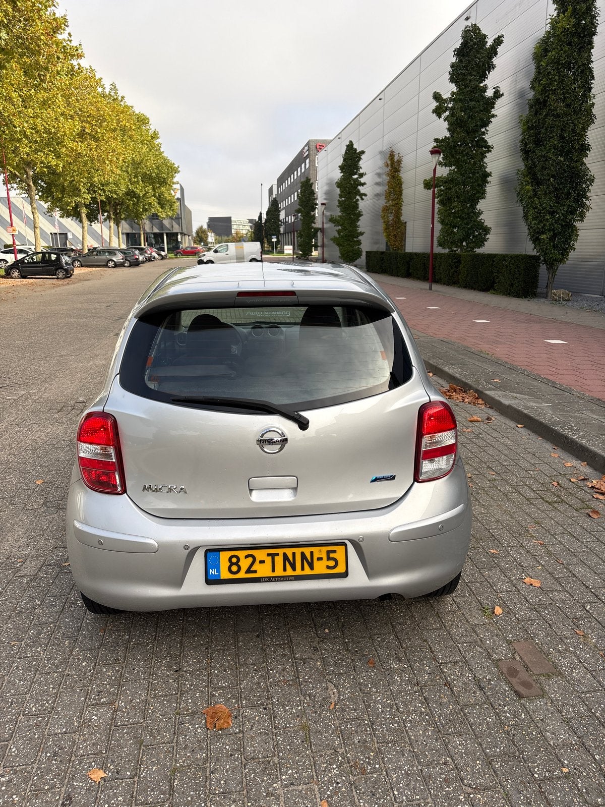Nissan Micra 1.2 72KW 5DR 2011 Grijs, Auto's, Voorwielaandrijving, Dealer onderhouden, Stof, 40 €/maand