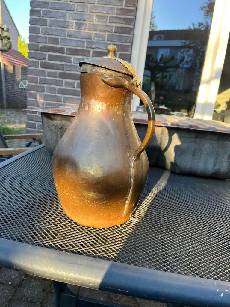 Oud koperen waterkannetje, Ophalen