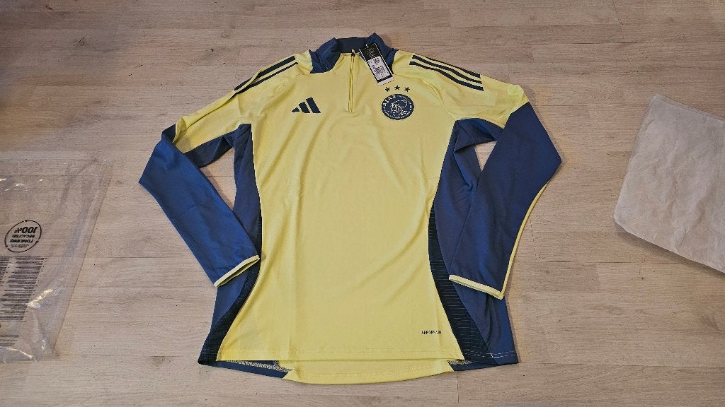 Ajax Training Sweater (Geel)! Seizoen 24/25! Mt XL! NIEUW!, Ophalen of Verzenden, Voetbal, Rood, Maat 56/58 (XL)