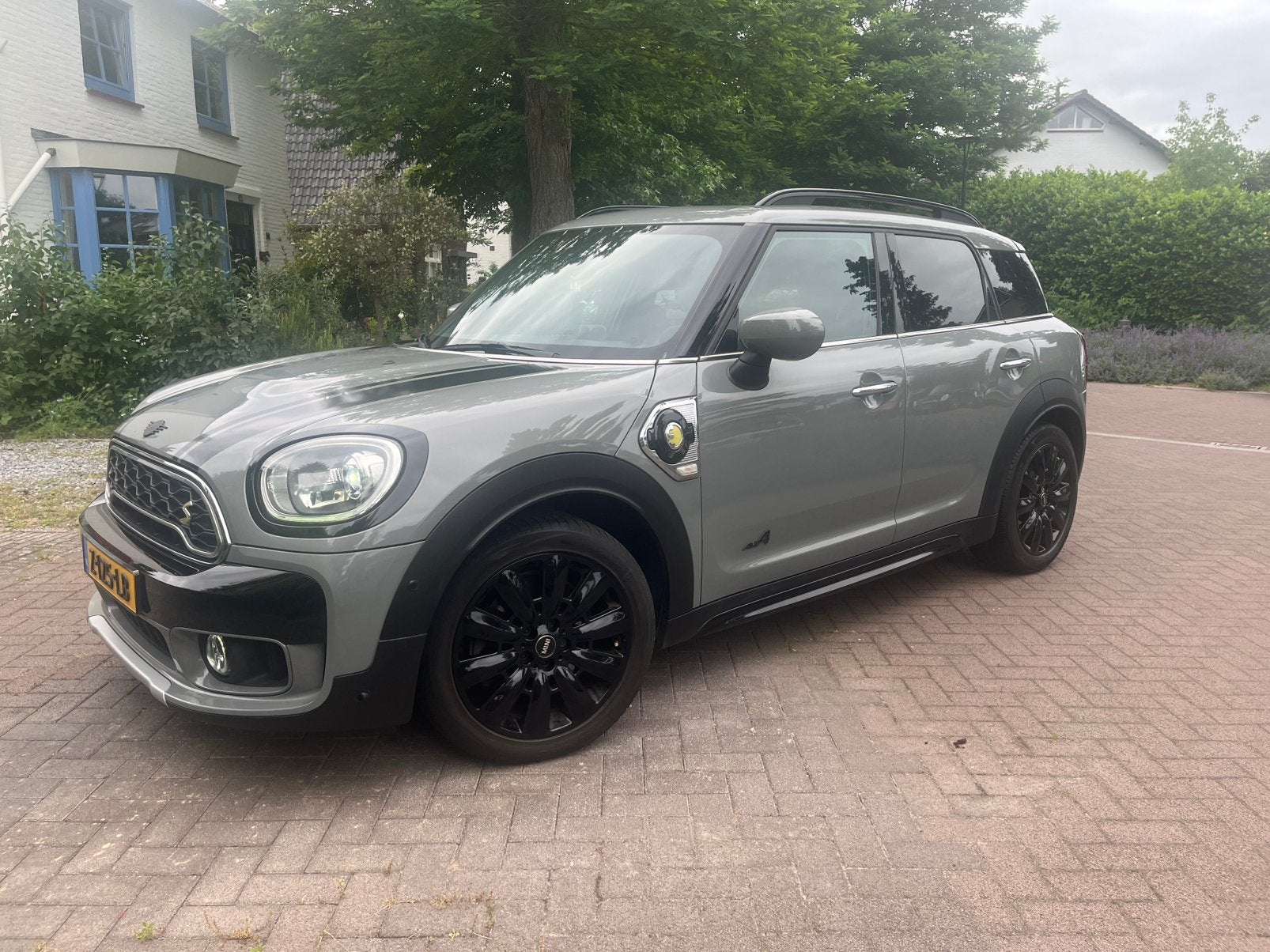 Mini Countryman SE hybride All 4 in luxe Chili uitvoering, Auto's, Mini, Automaat, Countryman, Leder, Vierwielaandrijving