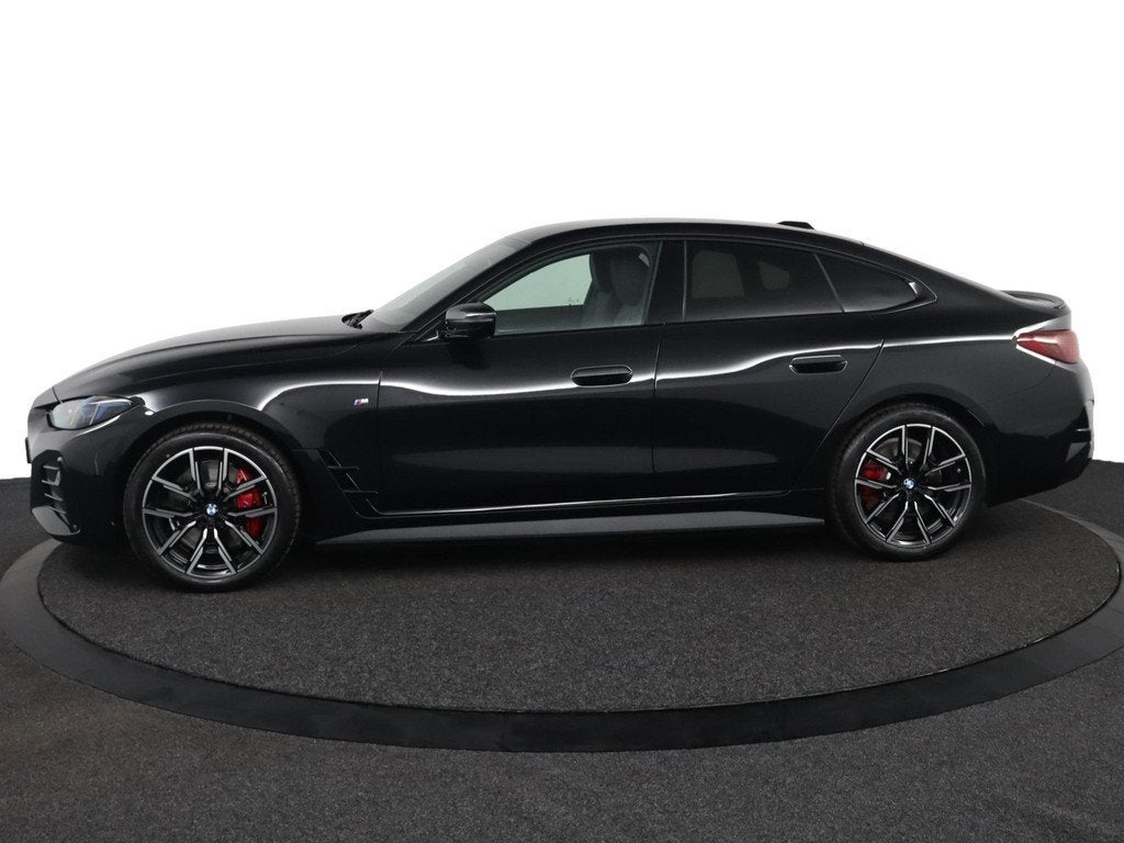 BMW i4 eDrive35 M Sport Pro Edition | Comfort Pack, Auto's, BMW, Achterwielaandrijving, Zwart, 491 km, Zwart