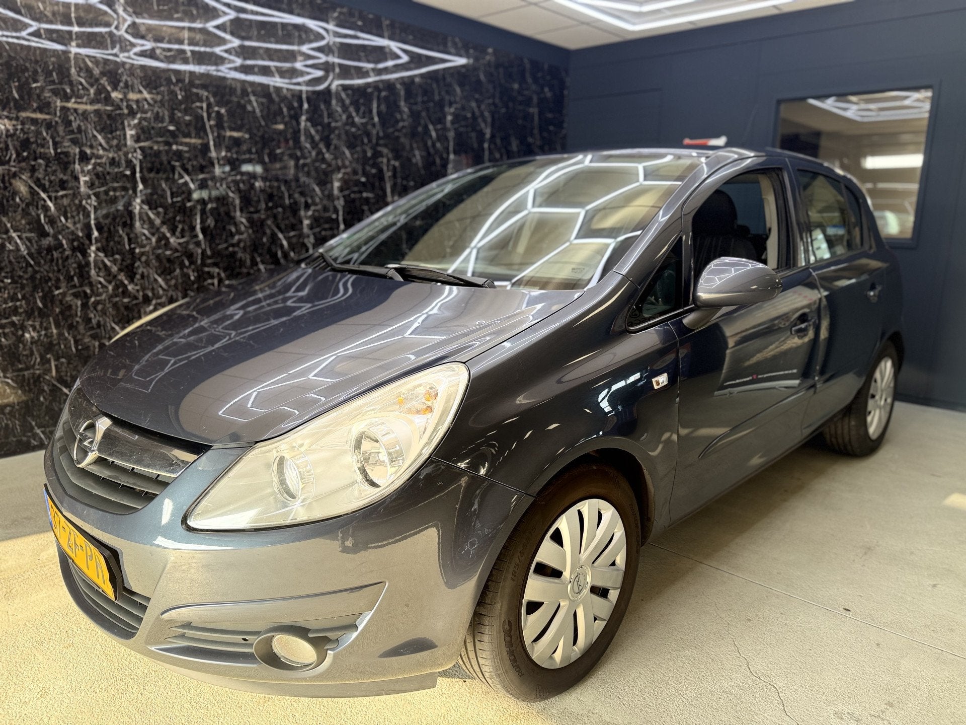 Opel Corsa 1.4-16V Enjoy (bj 2008), Auto's, Voorwielaandrijving, Gebruikt, Zwart, 4 cilinders