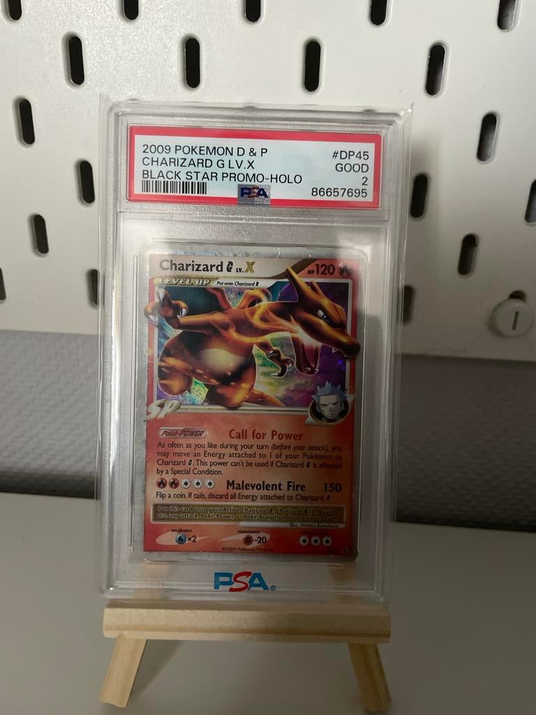 Charizard G LV.X Black Star Promo PSA 2, Ophalen of Verzenden, Losse kaart, Foil