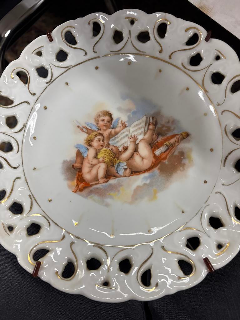 Decoratieve porseleinen wandplaat met engeltjes, Ophalen