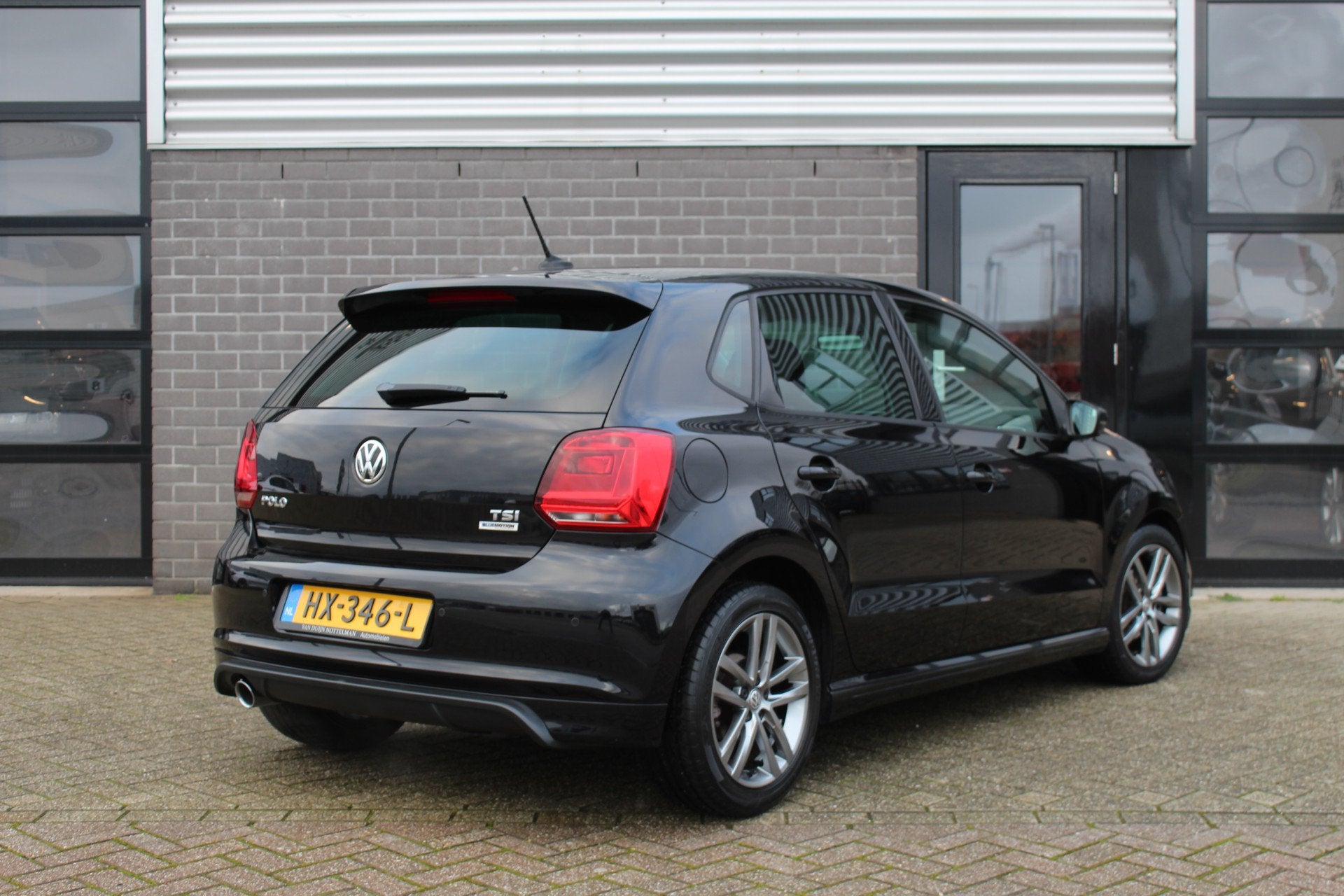 Volkswagen Polo 1.2 TSI Edition R / Navigatie / Clima / N.A., Stof, 4 cilinders, Met garantie (alle), Zwart