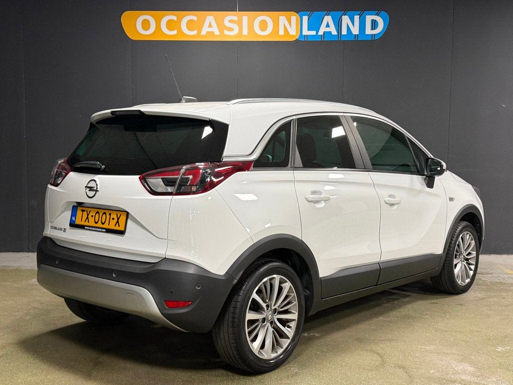 Opel Crossland X 1.2 Turbo Online Edition|PANO|360CAM|KEYLES, Auto's, Opel, 840 kg, Gebruikt, Leder en Stof, Wit