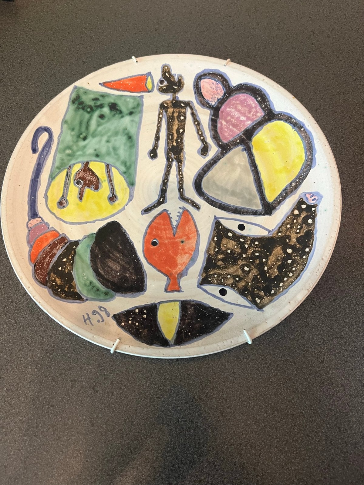 Oud wandbord 30 cm met abstracte decoratie, gesigneerd H99, Ophalen of Verzenden