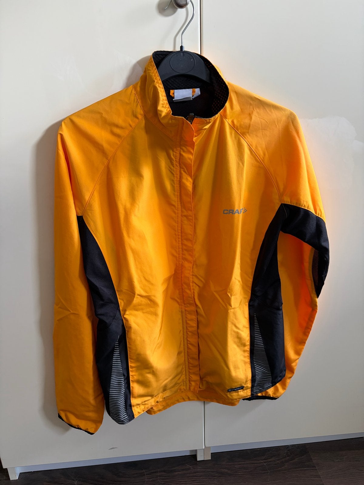 Craft hardloopjasje maat 38 (M), Maat 38/40 (M), Oranje, Ophalen of Verzenden, Zo goed als nieuw