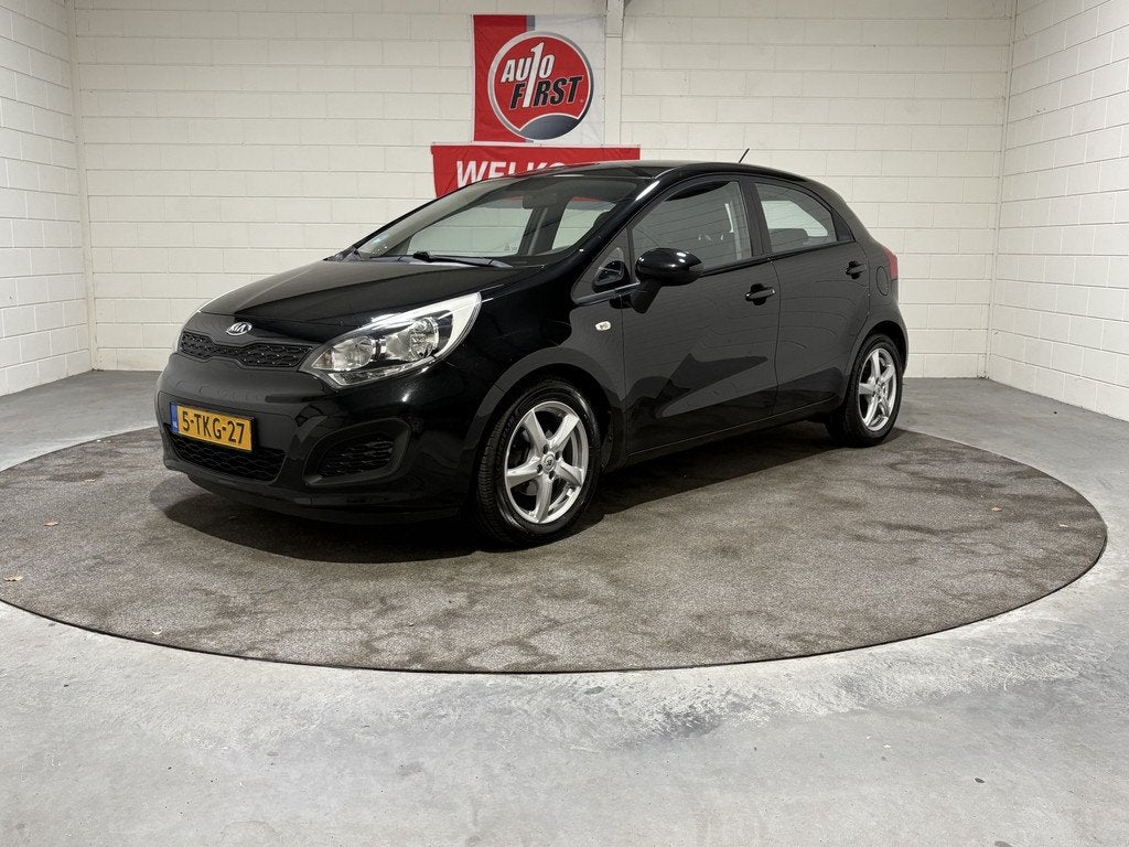 Kia Rio 1.2 CVVT ComfortLine, 2e eigenaar Dealer onderhouden, Auto's, Kia, 4 cilinders, Elektrische ramen, Zwart, Origineel Nederlands