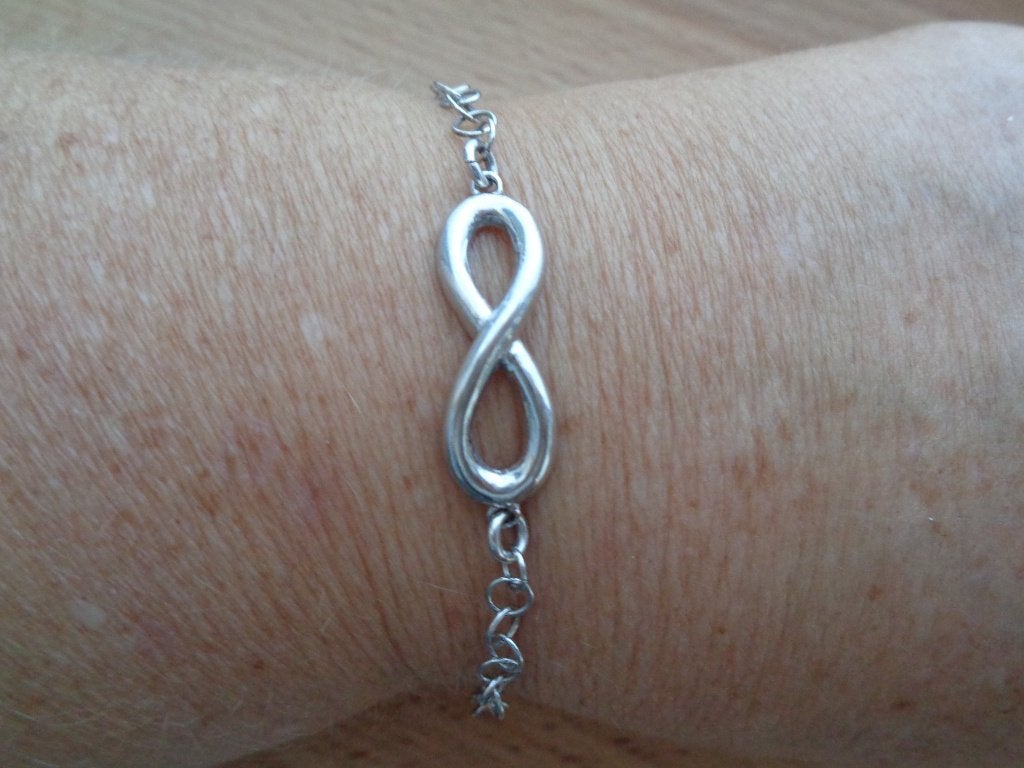 zilveren infinity armband [1113], Verzenden, Zo goed als nieuw, Zilver, Zilver