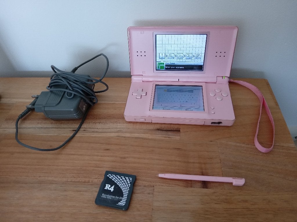 Nintendo ds lite roze + vele spellen, Spelcomputers en Games, Spelcomputers | Nintendo DS, Ophalen, Met games, Zo goed als nieuw