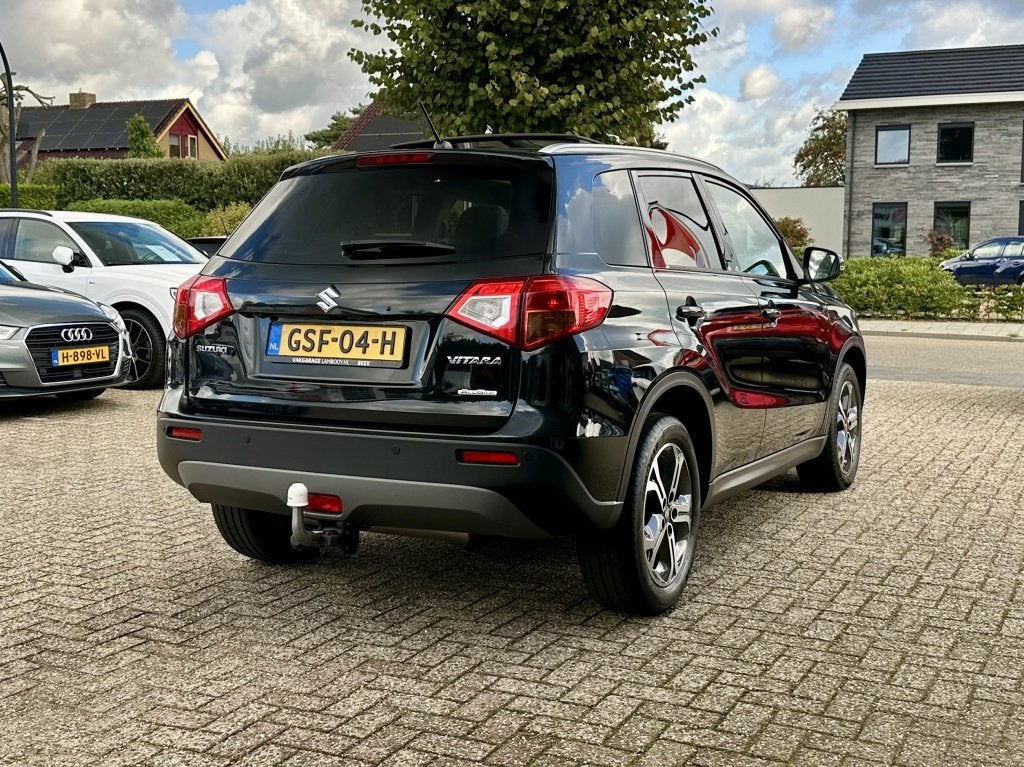 Suzuki Vitara 1.6 High Executive Allgrip Automaat Pano Trekh, Auto's, Gebruikt, Euro 6, 4 cilinders, 400 kg